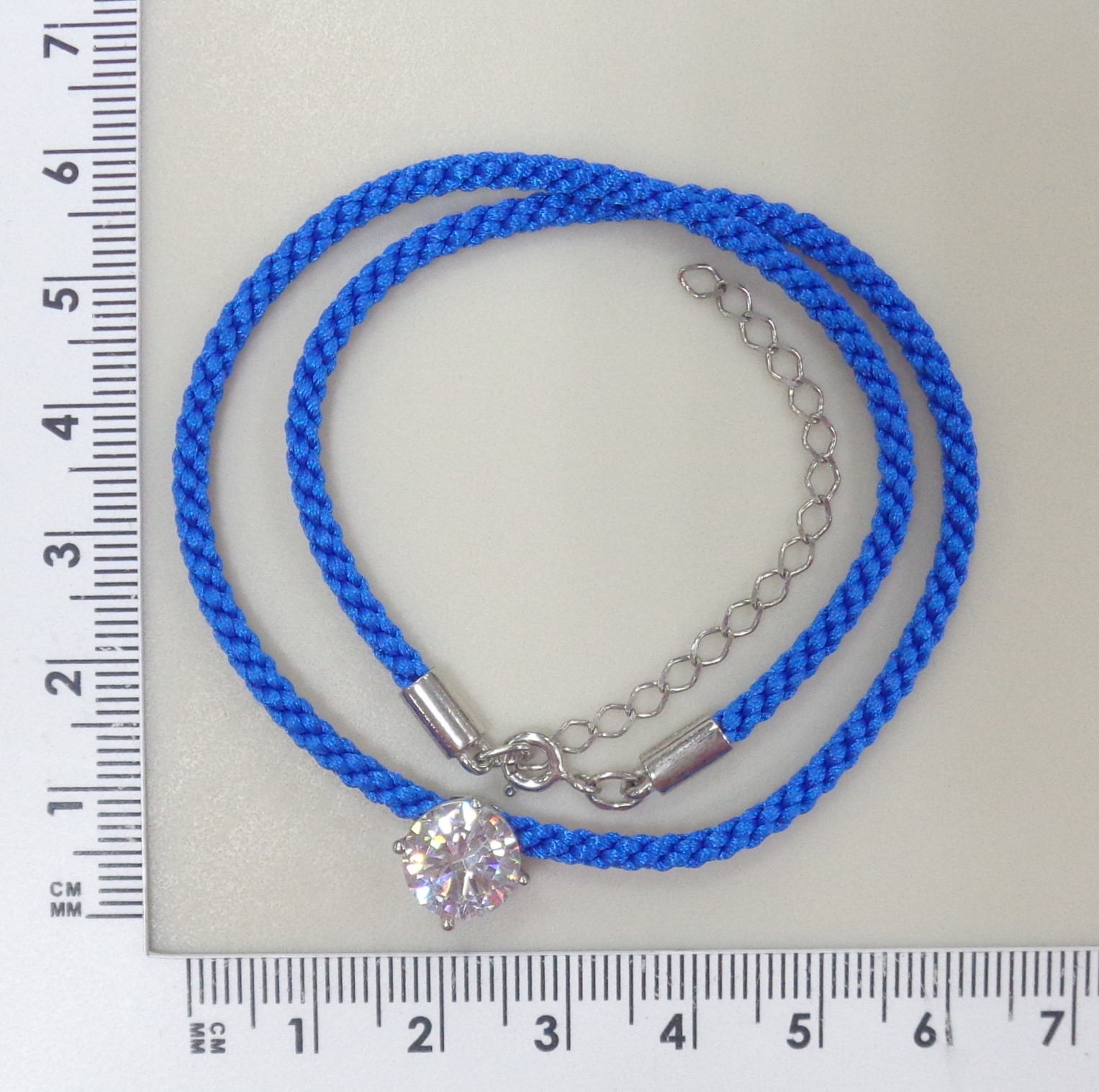 Серебряное колье с фианитом на шнурке